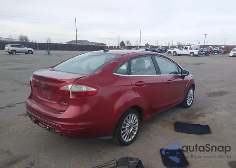 2016 Ford Fiesta Titanium z USA, uszkodzony, nr VIN 3FADP4CJ7GM158163